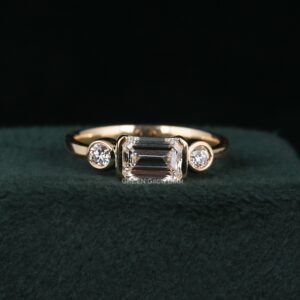 three stone emerald cut diamond ring